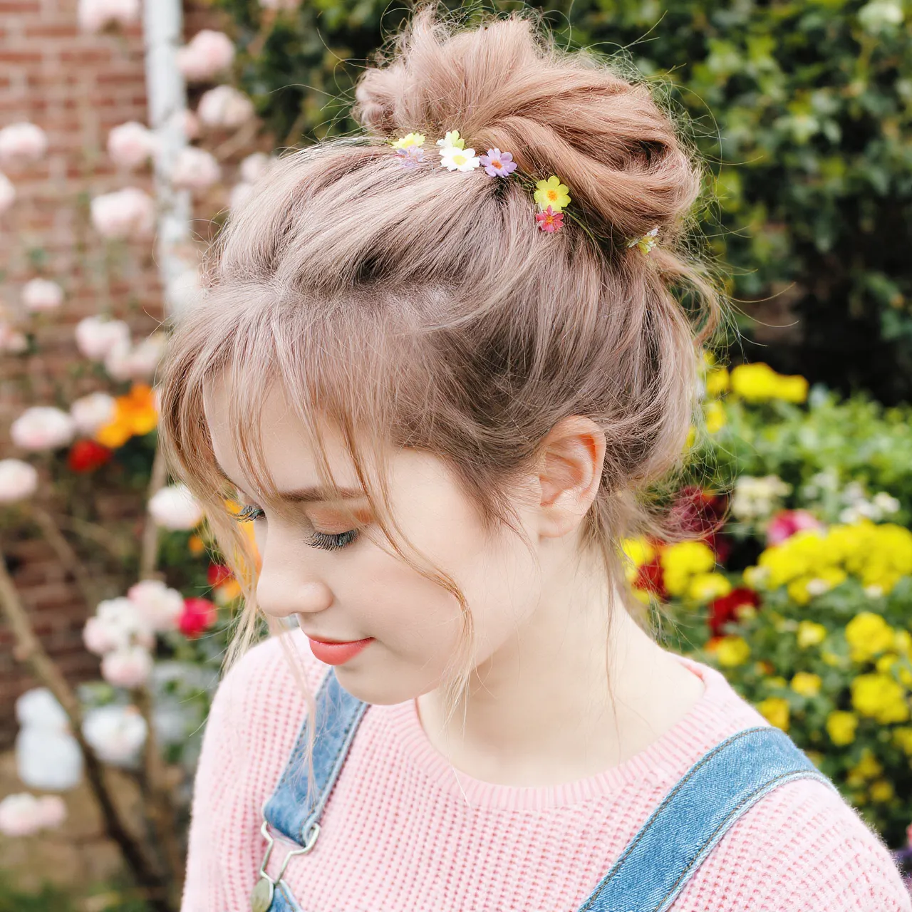25 Beautiful Hairstyles for Easter Ideas to Celebrate Spring in Style 14 Messy Bun with Floral Pins Ideas